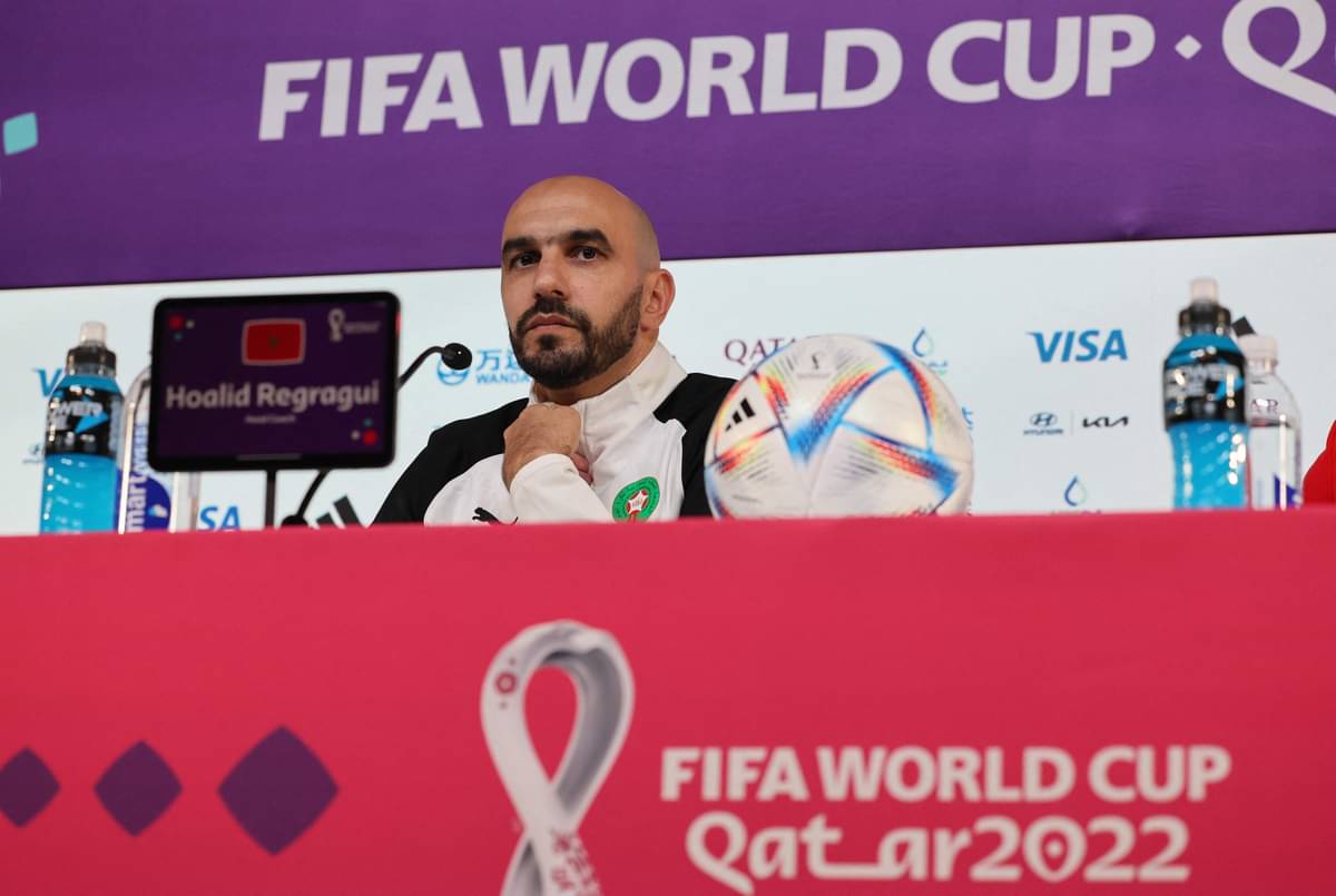 Pelatih orocco Hoalid Reragui saat konferensi pers di Qatar National Convention Center (QNCC) di Doha pada 5 Desember 2022,